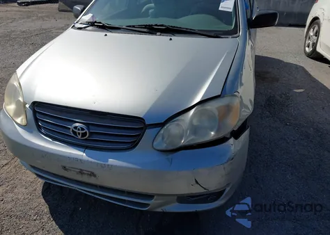 2003 Toyota Corolla Le z USA, uszkodzony, nr VIN 2T1BR32E13C136169